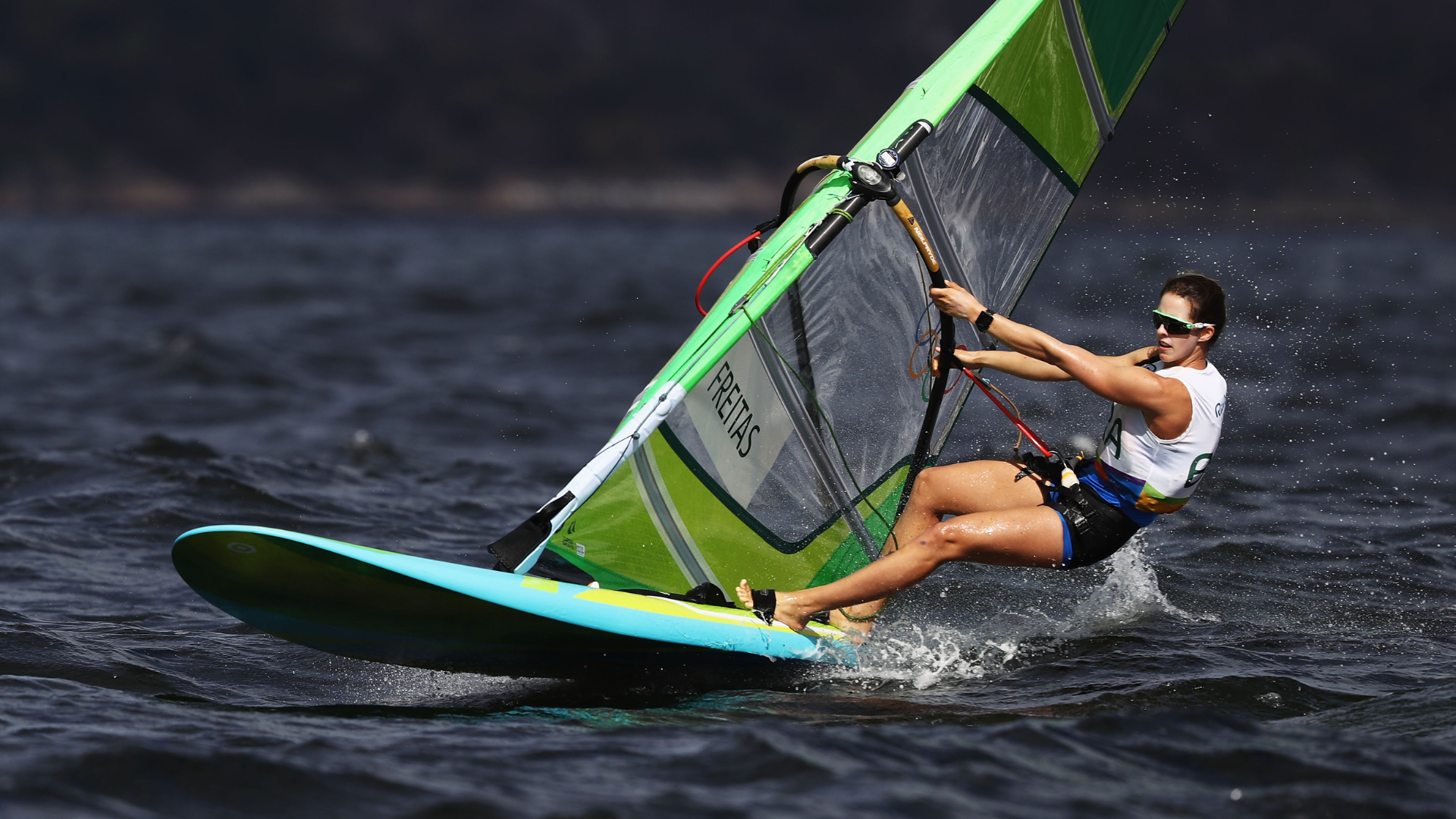 Patricia Freitas, Athlete Fellow at LA28 windsurfing on the open water