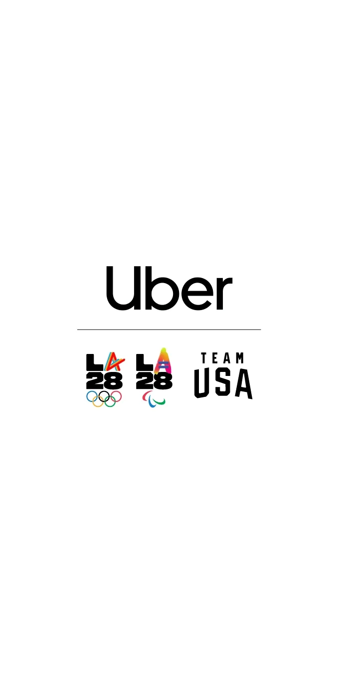 Una gráfica con el emblema de Uber ariba de los logotipos de LA28 y Team USA
